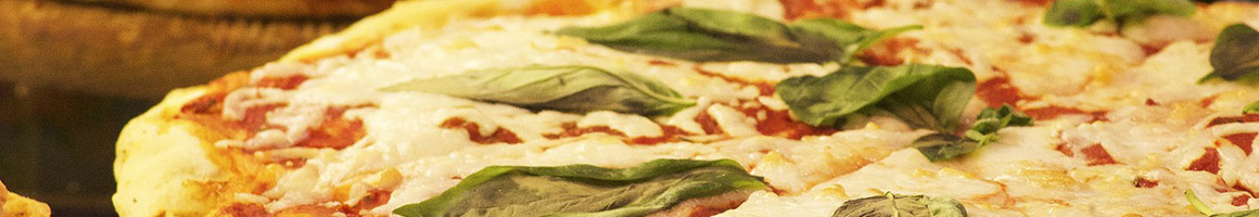 Eating Italian Pizza at Barone's Pizza restaurant in Lancaster, CA.